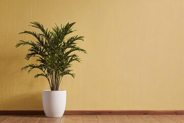 A plant in white pots with the yellow pastel wall.