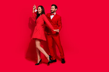 Full size photo of lovely young couple dance have fun disco valentine day dressed stylish elegant...