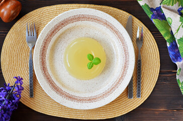 still life in a rustic style with jellied meat on a plate