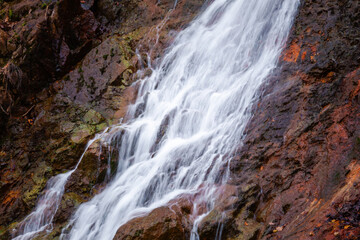 Fototapeta premium Scenic waterfall in slow motion flow