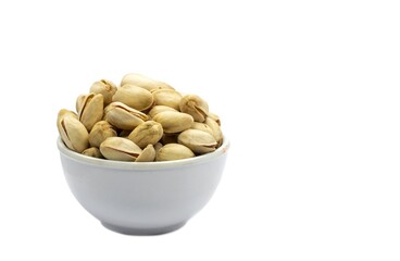 Pistachio Nut in a White Bowl Isolated on White Background with Copy Space in Horizontal Orientation