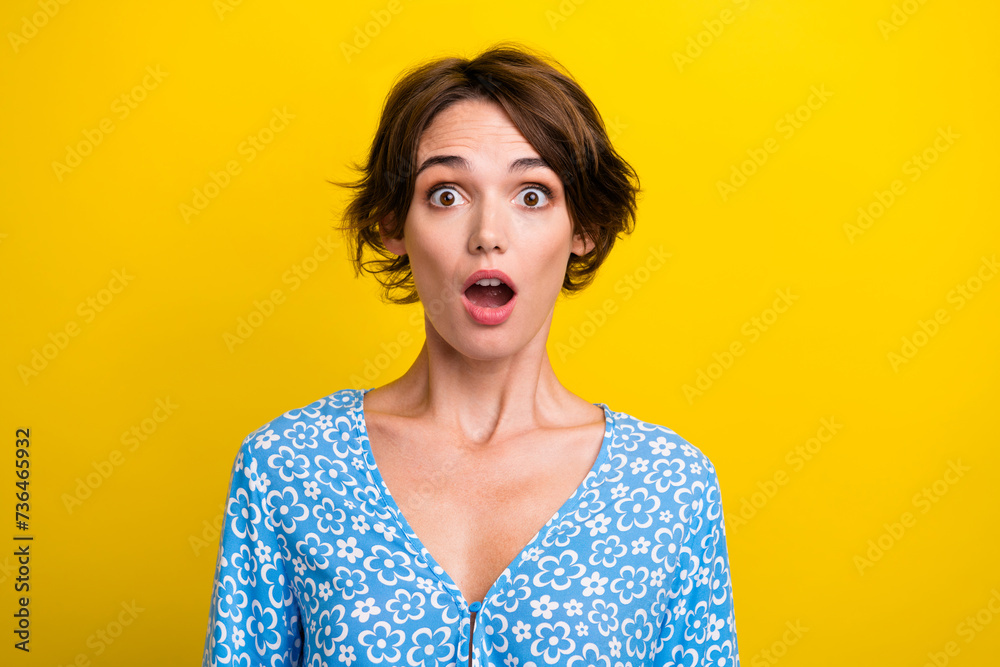 Sticker Photo of impressed funky young woman wear flower print blouse open mouth isolated yellow color background