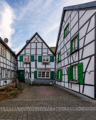 Fototapeta premium Typical medieval old town with half-timbered houses in Altesdorf Westerholt in Germany