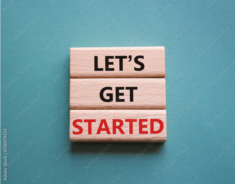 Canvas Prints lets get started symbol. concept words lets get started on wooden blocks. beautiful grey green backg