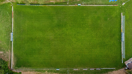 Football field of a small club from above, drone shot