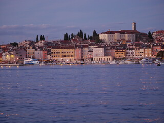 View of the embankment of Rovinj from the sea. The ships are in the harbor