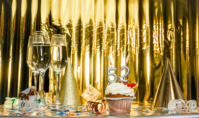 Background date of birth with number 52. Scenery festive glasses of champagne, anniversary in...