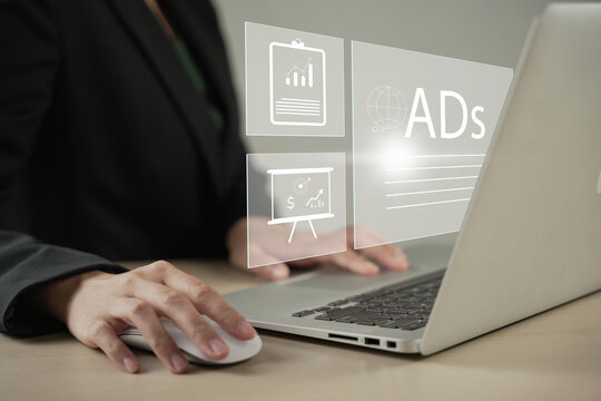 Digital marketing commerce online sale concept, Businessman use laptop with advertising on website. planning advertising marketing strategies to target social media native, ad, advertisers, sales.