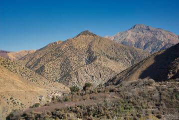 Fototapeta na wymiar Mountains seen from Sti Fadma village and Adrar Meltsene peak in background, Ourika valley, Atlas, Morocco