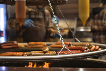 Chef at a large barbecue, skillfully grilling and preparing delicious food