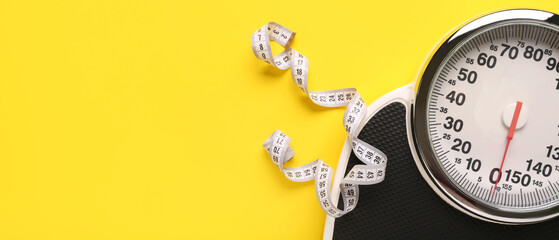 Scales and measuring tape on yellow background with space for text. Weight loss concept - obrazy, fototapety, plakaty