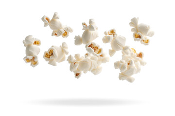 Multiple pieces of popcorn captured in mid-air isolated on transparent background.