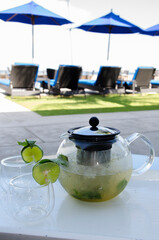 Herbal tea on a pool background  - 736545125