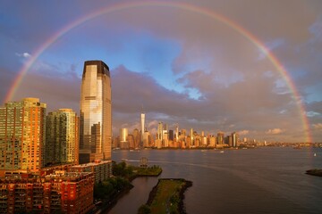 Rainbow over Lower Manhattan. - obrazy, fototapety, plakaty