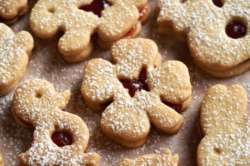 Linzer cookies in the shape of four leaf clover and Easter animals