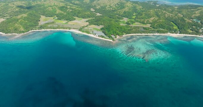 Tropical agricultural land and blue sea in Santa Fe, Tablas, Romblon. Philippines.