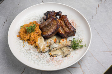 a delicious meat dish of Asian cuisine in a restaurant or pub. Close-ups