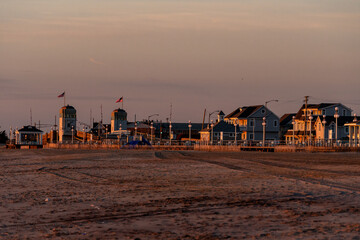 Avon By the Sea, New Jersey, USA - Golden hour from the beach looking at the homes on Ocean Ave and...