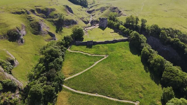 View Towards Castleton village Through The Grounds Of Peveril Castle or footage shows Castle and surrounds, Derbyshire,