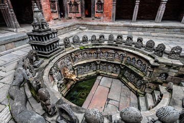 carved stone fountain at durbar square, kathmandu