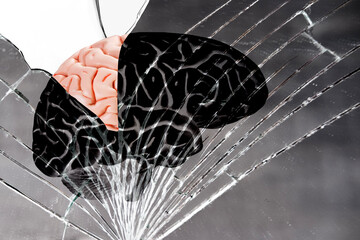 human brain on cracks texture broken mirror, glass background, neuroscience research aimed...