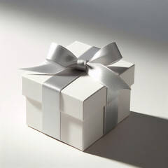 Caja de regalo blanca con lazo de cinta roja, aislada sobre fondo blanco