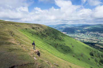 Hiker Backpacker on the mountain of Abergavenny, wales, England, summer outdoor