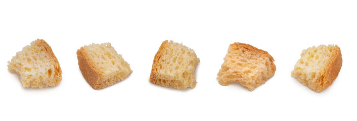 Set of croutons of wheat bread isolated on transparent background with shadows. High resolution...