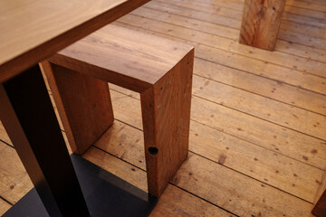 Wooden Bench on Hardwood Flooring.