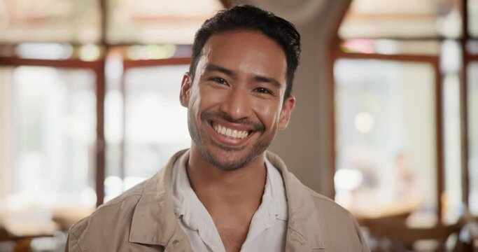 Face, smile and man at restaurant to relax, leisure and positive facial expression at coffee shop in Mexico. Portrait, happy person and entrepreneur customer in cafe laughing and excited at cafeteria