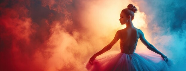 A ballerina wearing a blue dress striking a pose while standing amidst the clouds during her...