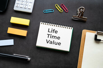 There is notebook with the word Life Time Value. It is as an eye-catching image.