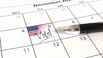 US presidential election will take place on November 5, 2024. A calendar with a US flag and the text "Vote!" at the 5th of November. A pen lying on the calendar sheet.