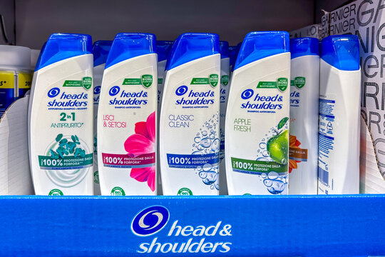 Italy - February 06, 2024: Head and shoulders dandruff shampoo in various types of packaging displayed for sale in Italian supermarket. Produced by Procter and Gamble