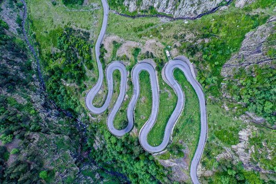 Drone shot, aerial photo, serpentine in the Pyrenees, country road in the mountains, Aragnouet, Departement Hautes-Pyrenees, France, Europe