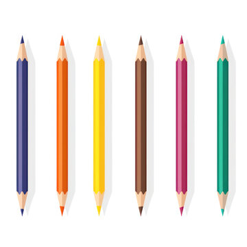 Colorful Stationery Set: A Bright Spectrum of Colored Pencils on a Wooden Background