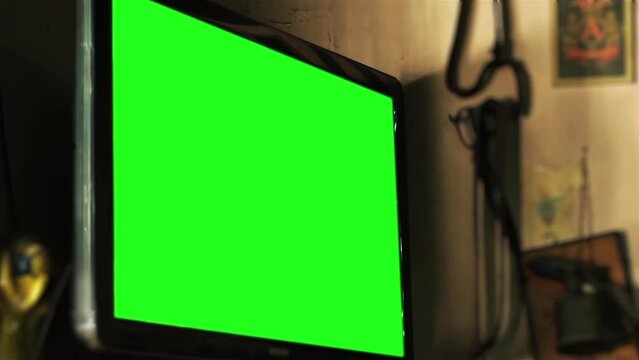 Old Television with Green Screen Inside a Vintage Restaurant in Buenos Aires, Argentina - Close Up