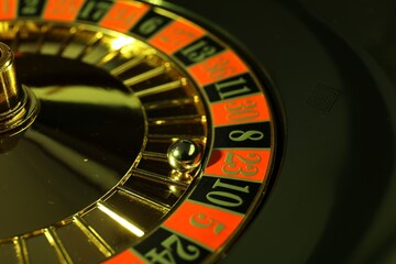 Roulette wheel with ball, closeup. Casino game