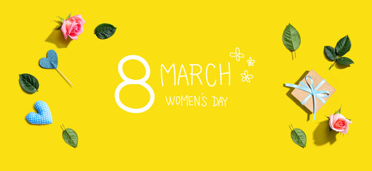 Happy women's day message with a small gift box and roses