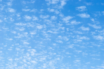 gentle clouds in the blue sky