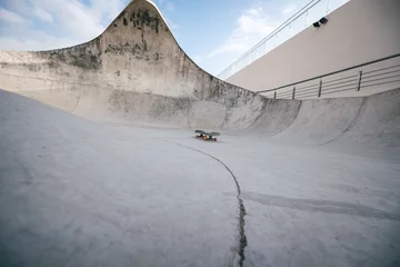 Fotobehang Modern concrete skatepark in city © lzf