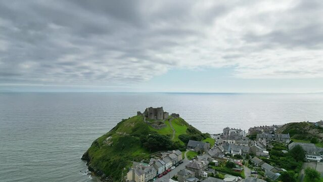 Aerial view of Criccieth castle and Cardigan Bay late afternoon, Gwynedd, North Wales, UK
