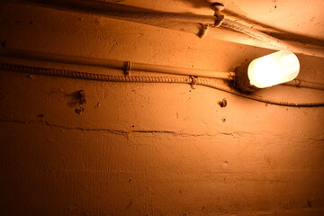 Dark orange light in old military bunker.