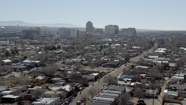 Downtown Albuquerque, New Mexico with wide show drone video moving in a circle parallax.