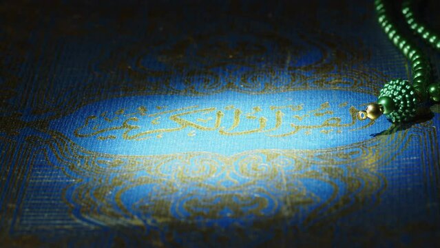 Religion The Book of Islam Quran and Rosary Beads