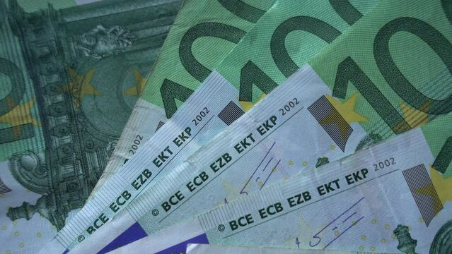 100 euros Bank Notes rotates as Background