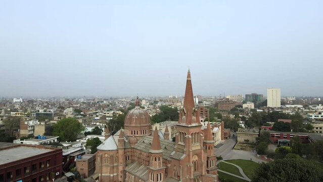 Sacred Heart Cathedral Church of Lahore, aerial view by a descending drone. This historical church was built in 1893 and is also called Roman Catholic Archdiocese of Lahore.