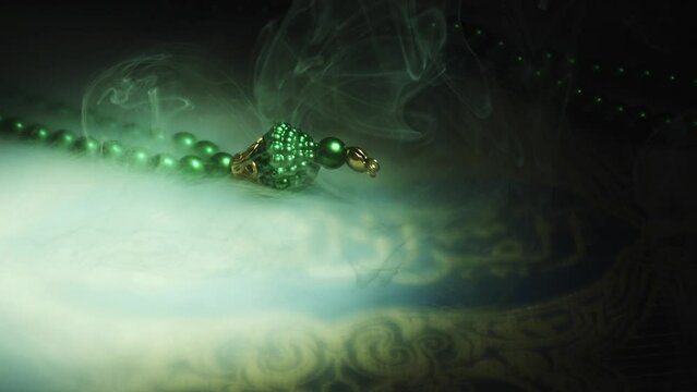 Religion The Book of Islam Quran and Rosary Beads