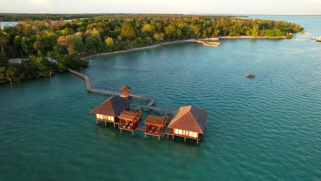 Two Exotic Overwater Bungalows with Decks for Suntanning and Long Pier Connecting Villas to Leebong Island, Belitung Indonesia - Aerial Parallax