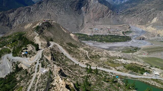 Stunning Aerial Panorama of Mountain Range and Small Dhumba Lake in Mustang District of Nepal - Drone Pan